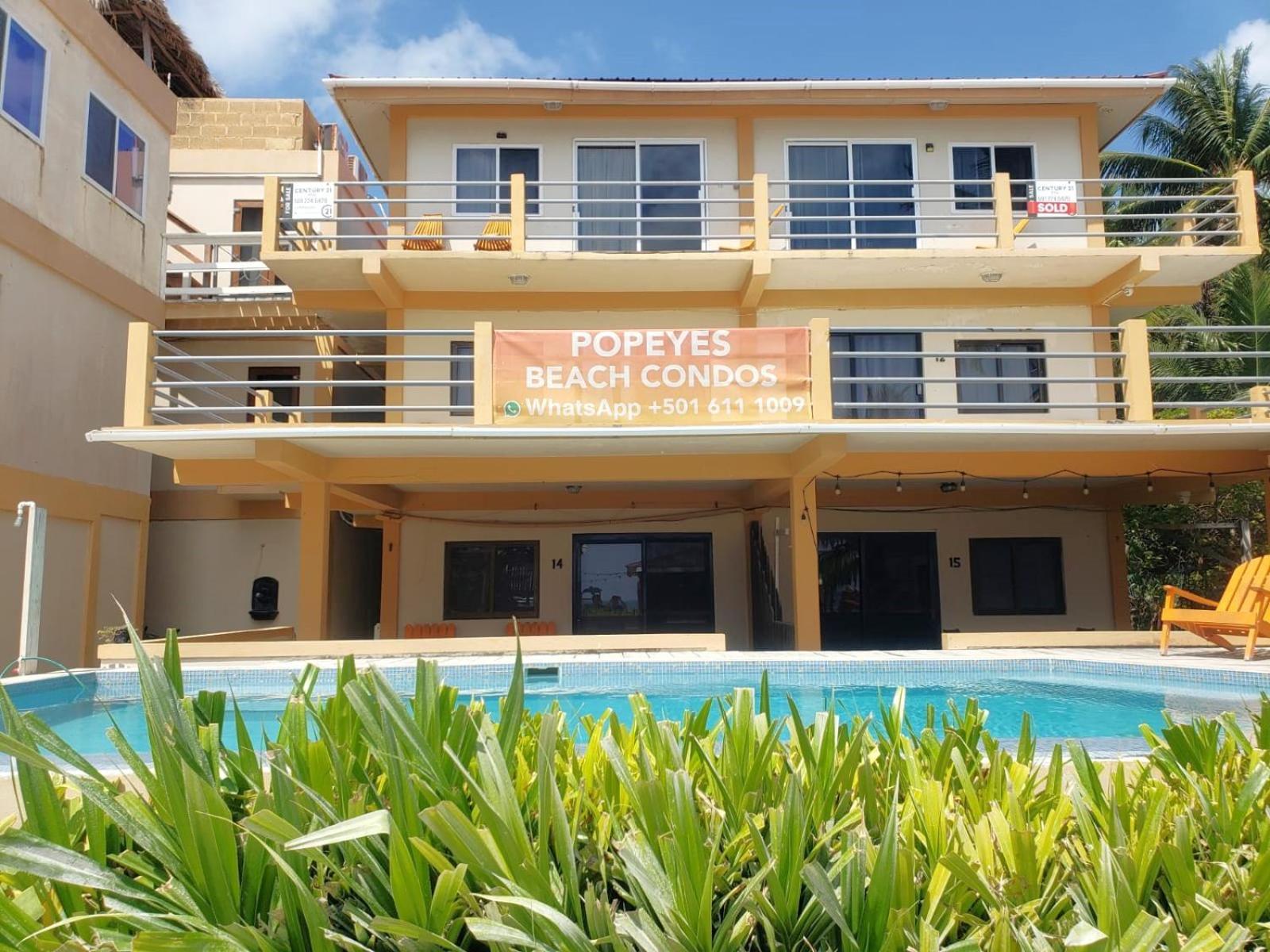 Beach Club Budget Rooms At Popeyes Кей-Колкер Экстерьер фото